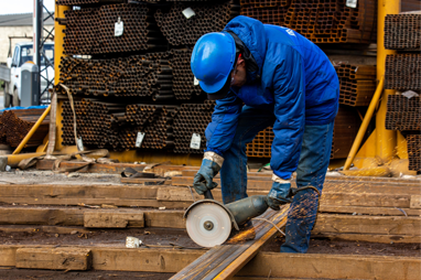 Worker preparing building materials